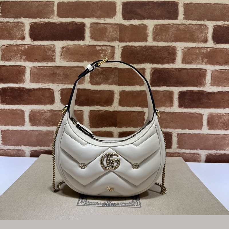 G*u*i top handle bags